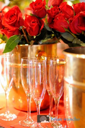 Red roses and champagne glasses. Event photographer in El Paso